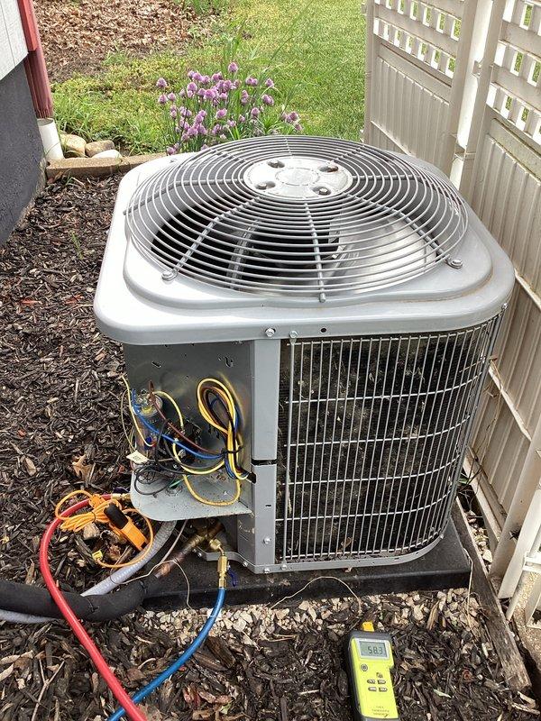 Completed scheduled cooling system maintenance visit as part of membership agreement. Performed comprehensive AC tuneup on residential outdoor condensing unit, including refrigerant pressure testing and system diagnostics using manifold gauges. Verified proper operating pressures, inspected electrical connections, and ensured unit functionality for optimal cooling season performance.