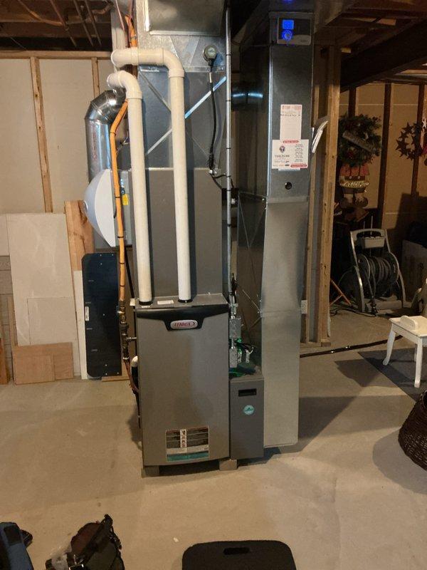 Completed furnace and air conditioning tune-up on Lennox heating system and air handler unit located in basement mechanical room. Performed standard seasonal maintenance inspection, checked all operational components, and verified proper system function. Customer declined additional air handler cleaning and checking services at this time.