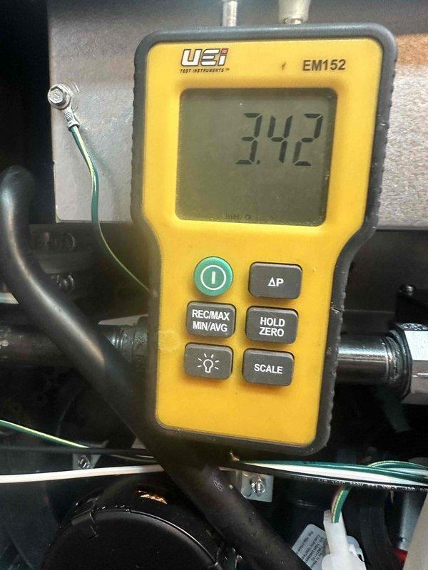 # HVAC Furnace Installation

Completed installation of 80% efficiency gas furnace at residential property. Installed new furnace unit with proper venting and gas line connections. Performed comprehensive system diagnostics using digital manometer to verify proper operation. Measured gas pressure at 0.342" W.C. and temperature rise at 71.6°F, confirming unit is operating within manufacturer specifications. Verified all electrical connections, tested safety controls, and ensured proper airflow through the system. Unit commissioned and left in full operational status.