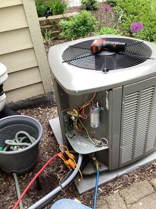 Completed prepaid membership cooling maintenance visit on residential Bryant HVAC system. Performed comprehensive inspection of indoor furnace unit and outdoor condensing unit, including visual assessment of all accessible components, electrical connections, refrigerant lines, and drainage systems. Connected manifold gauges to outdoor unit service ports to verify refrigerant pressures and system performance. Inspected capacitor, contactor, and wiring at outdoor unit with access panel removed. Verified proper operation of condensate drainage, PVC venting, and all mechanical components. System operating within normal parameters with no deficiencies noted.