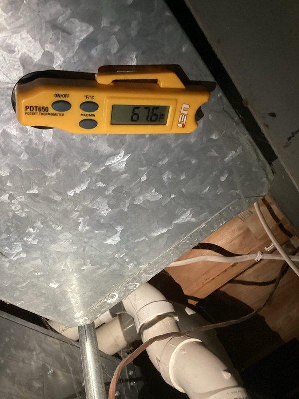 Completed routine cooling system maintenance visit as part of prepaid membership service. Performed standard inspection of HVAC equipment, ductwork, and associated components including condensate drain lines and copper refrigerant piping. Documented system temperature readings at 67.6°F and verified proper airflow through galvanized ductwork connections. All components found operating within normal parameters with no immediate service needs identified.