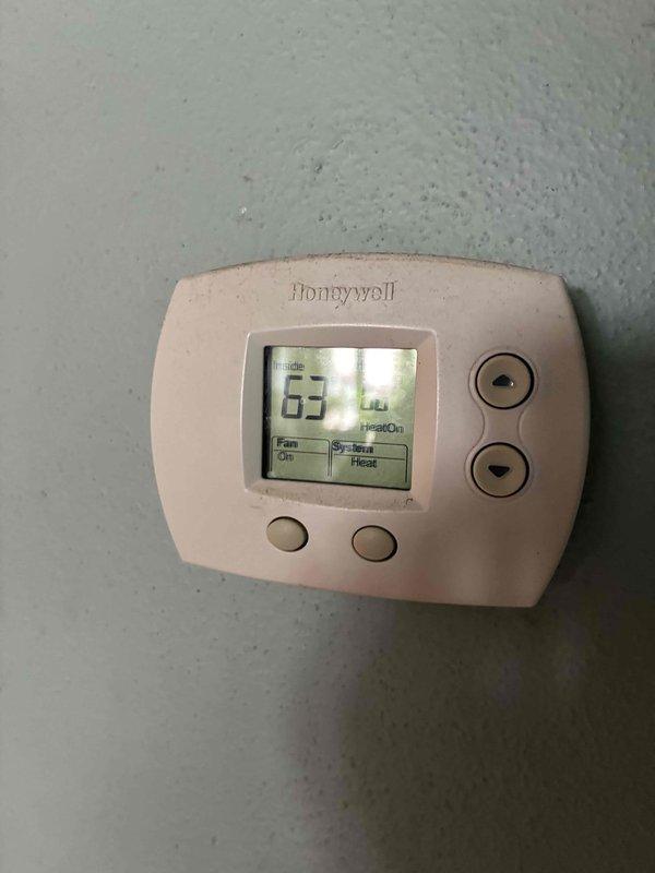 Responded to service call for dual-zone HVAC system with upper unit reported as non-operational. Performed comprehensive diagnostic evaluation of both upper and lower Lennox cooling systems as part of membership maintenance visit. Inspected Honeywell thermostat controls, verified proper communication and settings, and assessed outdoor condenser unit operation including fan motor function, refrigerant lines, and electrical connections. Completed standard tune-up procedures on both units to ensure optimal performance and system reliability.