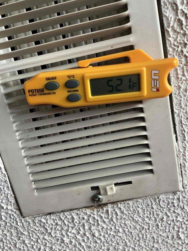 Completed comprehensive cooling system tune-up and preventative maintenance inspection as part of prepaid membership agreement. Performed standard maintenance protocol on outdoor condenser unit, including inspection of exterior cabinet condition, fan operation, and refrigerant line connections. Measured and verified supply air temperature at interior register, recording 63°F output, confirming proper system cooling performance and airflow delivery.