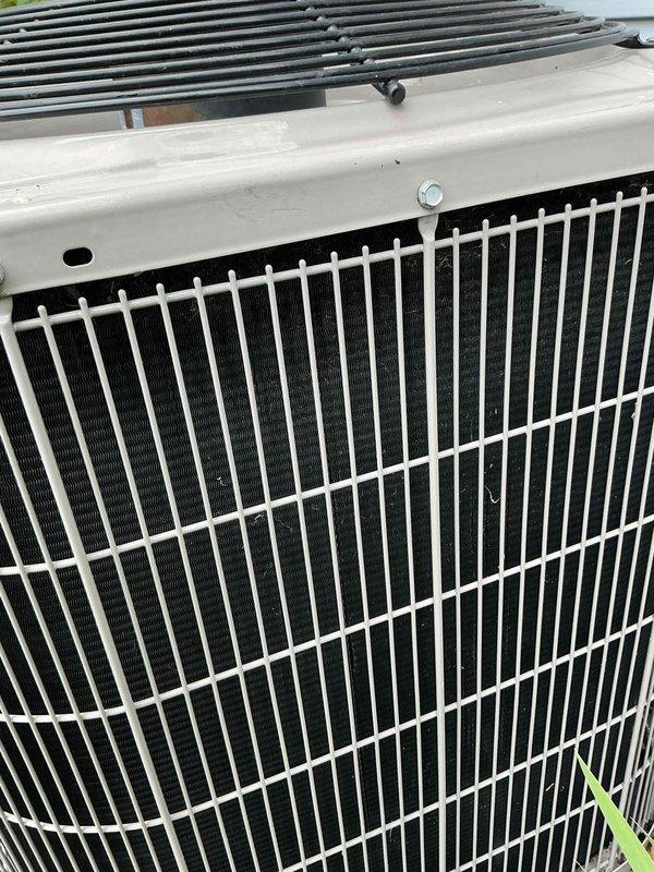 Completed scheduled cooling system maintenance visit under membership agreement. Performed comprehensive A/C tune-up including system diagnostics with multimeter testing, inspection of outdoor condensing unit components, and verification of proper operation. Unit showing normal wear consistent with outdoor exposure; all systems functioning within manufacturer specifications.