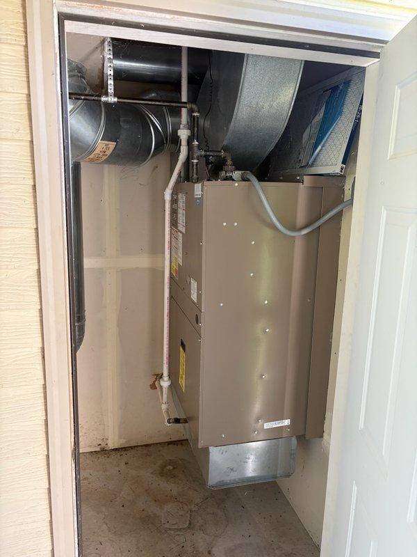 Responded to no cooling complaint on Magic Pak unit experiencing short cycling behavior. Upon arrival, diagnosed system repeatedly starting and stopping in rapid succession, indicating potential issues with control board, thermostat communication, or safety limit switches. Performed diagnostic evaluation of unit housed in interior utility closet, inspecting air handler cabinet, ductwork connections, and electrical components to identify root cause of cycling condition.