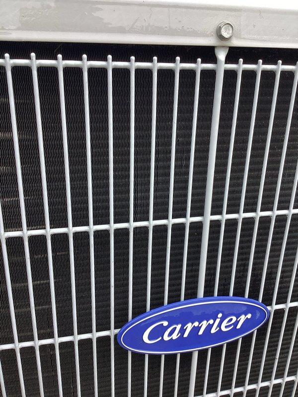 Completed scheduled air conditioning tune-up on residential Carrier condenser unit. Performed comprehensive system inspection, verified proper operation of all components, and confirmed condenser coils are clean with adequate airflow through protective grille. Unit is operating within normal parameters with no issues identified.