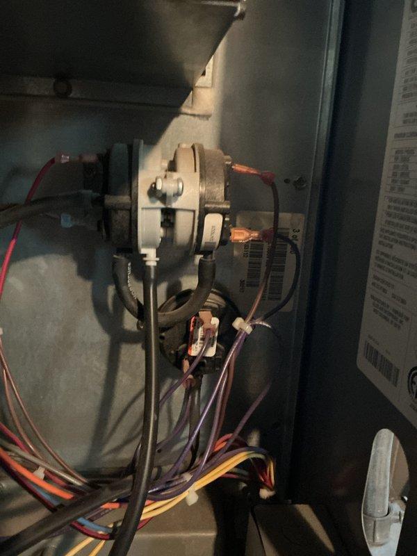 Responded to no heat call following third-party thermostat installation. Upon arrival, found newly installed Ecobee smart thermostat displaying 64°F actual temperature with setpoint holding at 73°F but system not calling for heat. Inspected furnace cabinet and verified all electrical connections at blower motor and control board were secure with proper wire terminations. Traced thermostat wiring from unit to wall location and confirmed compatibility between new smart thermostat and existing HVAC system wiring. Reconfigured thermostat settings to properly communicate with heating equipment, tested system operation through multiple heating cycles, and verified furnace ignition sequence and blower motor engagement. System now heating properly and maintaining programmed temperature setpoint.