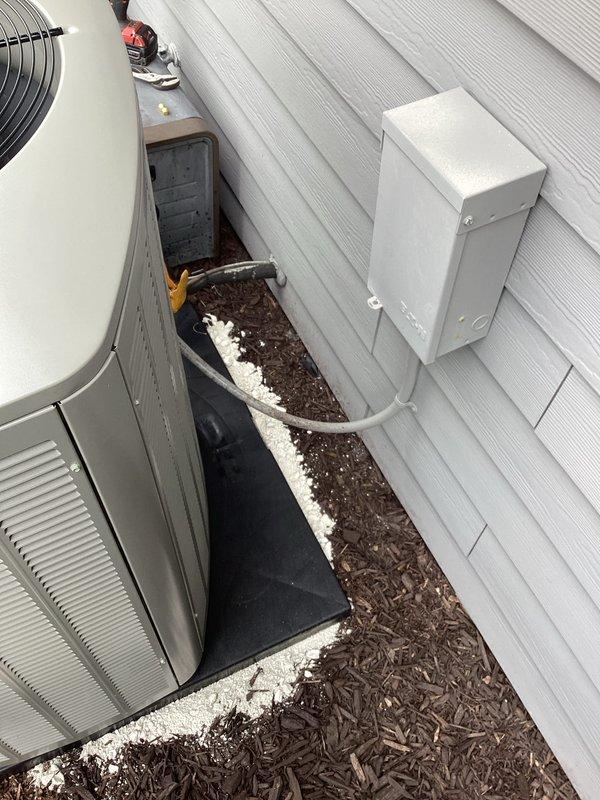 Completed installation of new HVAC system including outdoor condensing unit and indoor evaporator coil. The outdoor unit was mounted on the rooftop with proper electrical connections and refrigerant line routing, while the indoor air handler was installed in the basement mechanical room with copper refrigerant lines, condensate drainage system, and electrical components properly connected. All manufacturer specifications were followed, system was tested and verified operational.
