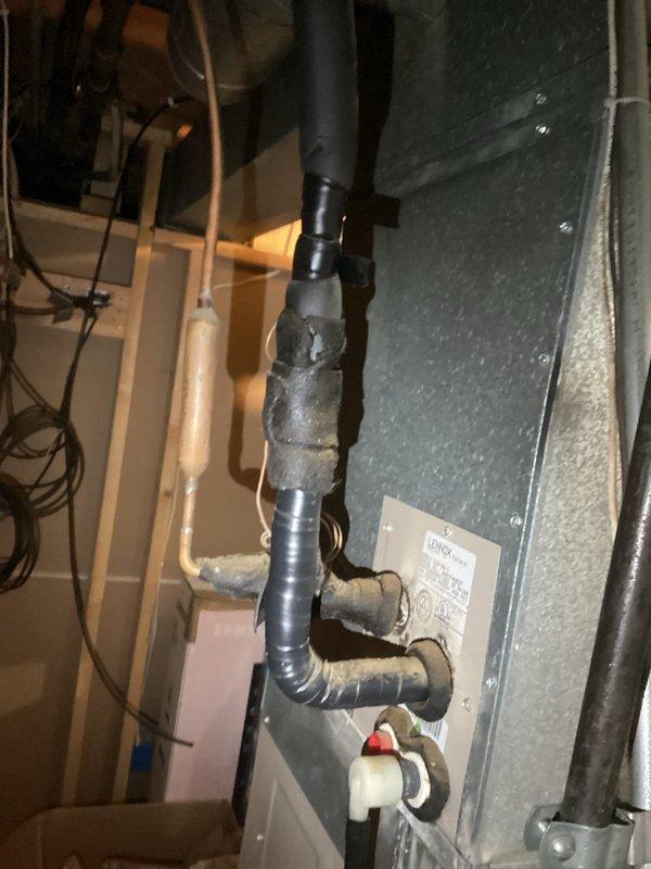 Completed routine cooling system maintenance visit as part of prepaid membership program. Performed standard inspection of HVAC equipment including examination of condensate drain piping system with PVC connections and drainage components. Verified proper operation of drain line shut-off valve. Conducted temperature diagnostics on ductwork system, recording supply air temperature reading of 65.8°F using calibrated digital thermometer. Inspected air handler cabinet, duct insulation, and associated mechanical components for proper operation and condition.