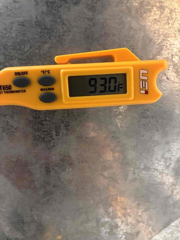 Completed comprehensive tune-up service on residential furnace and air conditioning system. Performed diagnostic temperature measurements using digital thermometer, recording supply air temperature of 93.0°F, and utilized true RMS multimeter to verify electrical readings at 59.88 volts across system components. All equipment tested and found operating within normal parameters.