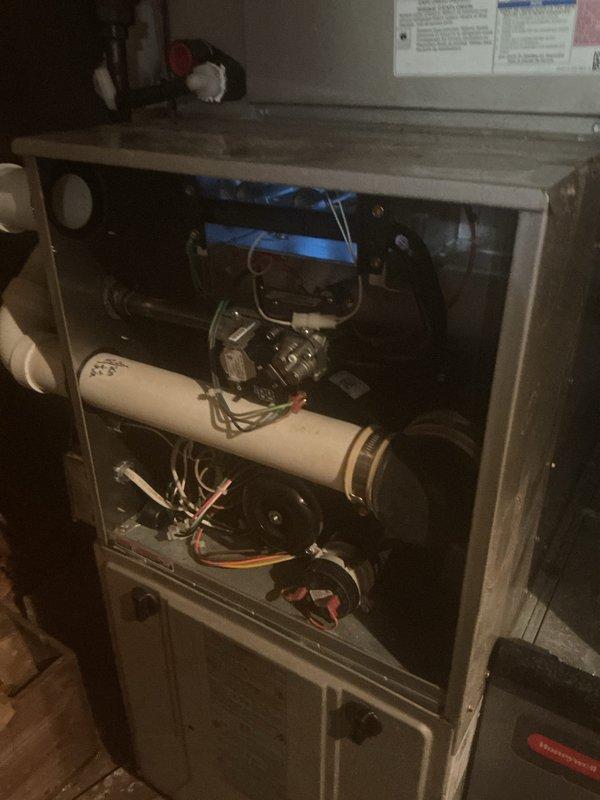 Completed furnace and air conditioning tune-up maintenance service. Performed system inspection with access panel removal, checked blower motor assembly and electrical connections, verified proper condensate drain operation, and tested refrigerant pressures using manifold gauges on outdoor unit. All components operating within normal parameters upon completion.