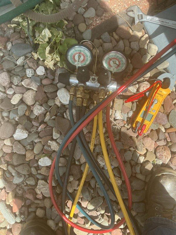 Completed furnace and air conditioning tune-up maintenance service. Performed system inspection with access panel removal, checked blower motor assembly and electrical connections, verified proper condensate drain operation, and tested refrigerant pressures using manifold gauges on outdoor unit. All components operating within normal parameters upon completion.