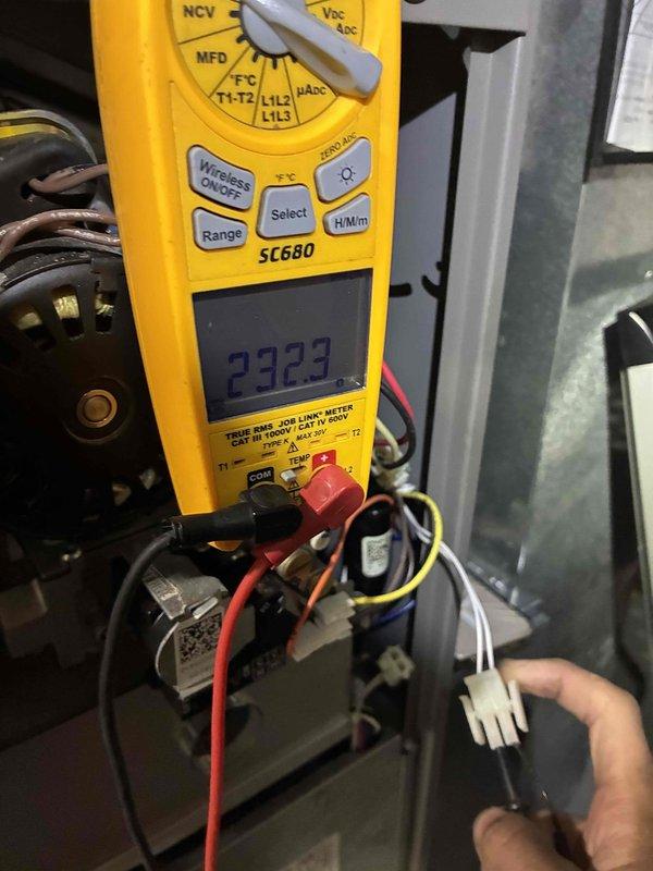 Responded to no heat call and performed diagnostic inspection of HVAC system. Found extensive dust and debris accumulation throughout ductwork and air handling components, restricting airflow. Tested electrical components with multimeter, confirming proper voltage readings of 232V at system connections. System restored to operational status following inspection and testing procedures.