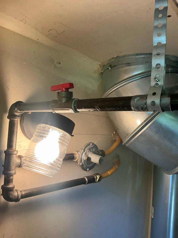 Responded to emergency service call for Magicpak system evaluation. Arrived within scheduled window and conducted comprehensive assessment of existing HVAC equipment and associated plumbing connections in utility area. Documented current system configuration including water heater installation, piping layout with ball valve controls, and condensate drainage routing. Photographed equipment conditions and prepared detailed replacement estimate for customer review.