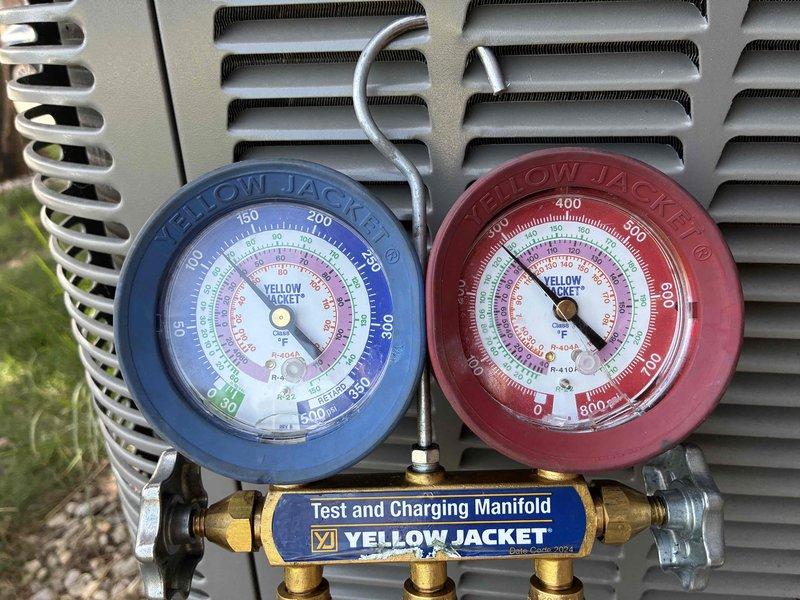 Responded to no cooling complaint on air conditioning system installed approximately one year prior. Upon arrival, confirmed indoor fan operation but compressor not engaging. Connected manifold gauge set to service ports and performed system diagnostics. Verified proper line pressures and determined cooling function failure, identifying cause and provided customer with repair options for restoring full system operation.