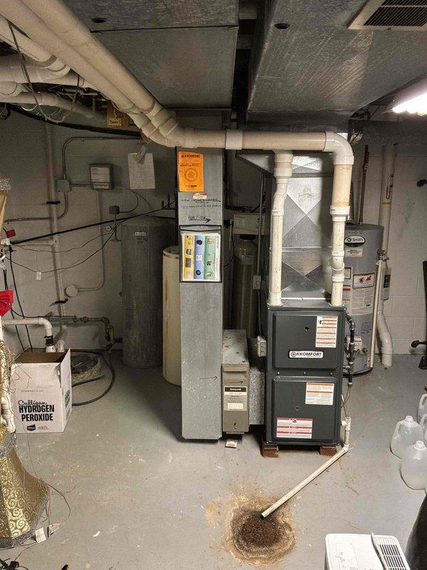 Conducted on-site assessment for complete HVAC system replacement. Evaluated existing 1994 air conditioning unit and furnace system located in basement mechanical room. System currently operational but nearing end of service life. Documented existing equipment configuration including gas furnace, outdoor condensing unit, refrigerant line sets, electrical connections, and ductwork layout. Provided comprehensive replacement estimate for new HVAC system installation.