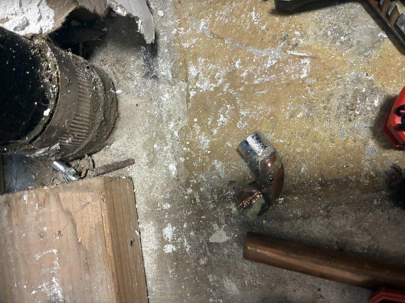 Responded to emergency plumbing call for leaking pipe within residence. Upon arrival, conducted diagnostic inspection and located source of leak in copper piping system showing significant corrosion and verdigris buildup. Assessed damaged pipe section and corroded fittings on rooftop mechanical installation area. Performed necessary repairs to stop active leak, replaced compromised pipe section and corroded coupling fitting. Cleaned work area and tested system to verify proper function and confirm no additional leaks present.