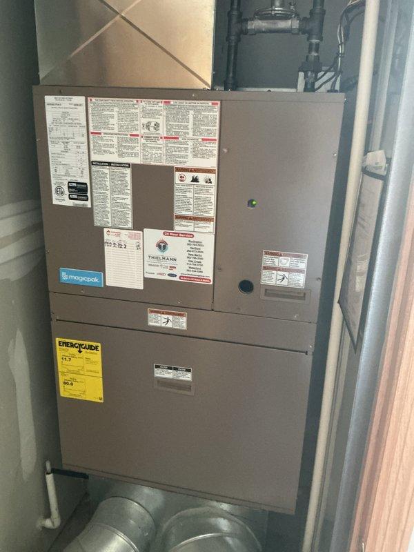 Completed comprehensive tune-up maintenance on residential Magicpak combination heating and cooling unit. Inspected serpentine heat exchanger coil assembly, verified proper operation of all components, and confirmed system is functioning within manufacturer specifications.