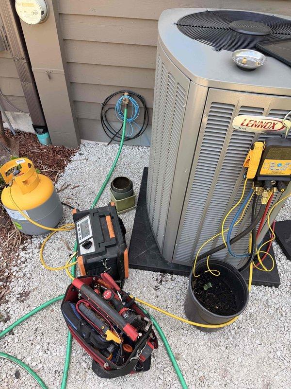 Performed complimentary air conditioning system start-up and operational verification. Conducted comprehensive system diagnostics using refrigerant gauges and electronic testing equipment on Lennox condenser unit. Inspected control board functionality, verified LED display operation, and confirmed proper defrost termination settings and operational mode configurations. All systems tested and operating within manufacturer specifications.