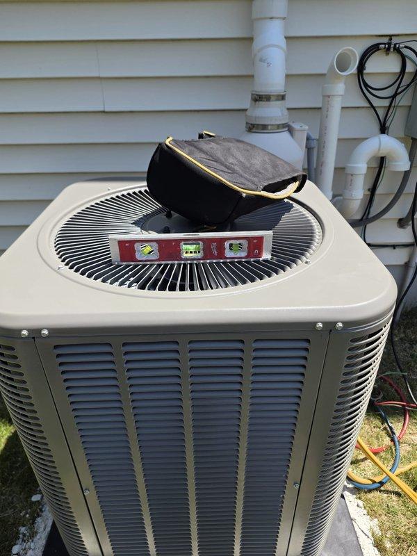 Completed full HVAC system installation including new furnace and air conditioning unit. Installed outdoor condenser unit on concrete pad with proper leveling, connected refrigerant lines, and established electrical service with disconnect box. Ran condensate drainage lines using PVC piping along exterior wall. Performed system startup, charged refrigerant to manufacturer specifications, and verified proper operation of both heating and cooling components. All work completed per COSTCO program requirements with payment collected on-site.