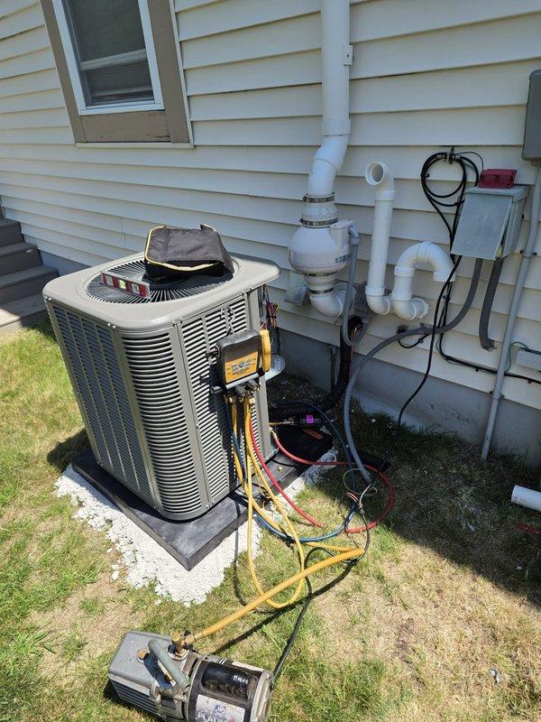 Completed full HVAC system installation including new furnace and air conditioning unit. Installed outdoor condenser unit on concrete pad with proper leveling, connected refrigerant lines, and established electrical service with disconnect box. Ran condensate drainage lines using PVC piping along exterior wall. Performed system startup, charged refrigerant to manufacturer specifications, and verified proper operation of both heating and cooling components. All work completed per COSTCO program requirements with payment collected on-site.