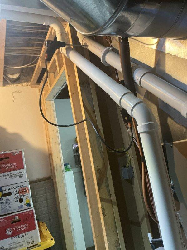 Performed complete air conditioning and furnace tune-up on residential HVAC system. Conducted electrical diagnostics using digital multimeter to verify system voltage and amperage readings, inspected ductwork installation and routing in attic space, and examined refrigerant line sets and PVC condensate drain lines for proper installation and secure mounting. All components found to be operating within manufacturer specifications.
