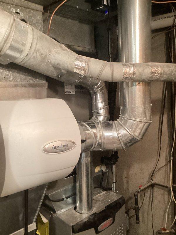 Completed warranty inspection of evaporator coil on residential HVAC system. Inspected ductwork connections, humidifier integration, and overall installation quality. All components verified to be properly installed with secure connections and appropriate sealing. System operating within normal parameters with no deficiencies noted.
