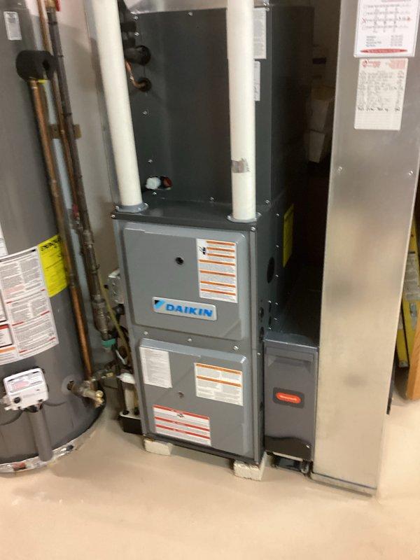 Performed comprehensive air conditioning tune-up on residential Daikin HVAC system. Conducted complete system diagnostics using manifold gauge set to verify refrigerant pressures and operating parameters, inspected indoor furnace unit and outdoor condenser components, and confirmed all equipment operating within manufacturer specifications.
