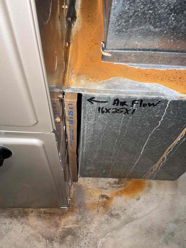 Conducted on-site estimate for complete air conditioning system replacement in single-story condominium unit. Evaluated existing furnace and HVAC equipment located in utility room, documenting current system configuration including ductwork, condensate drainage, and electrical connections. Photographed equipment showing age-related wear, discoloration on air handler components, and rust staining along ductwork seams, indicating potential moisture infiltration issues. Gathered necessary information to prepare replacement estimate for neighboring unit as well.