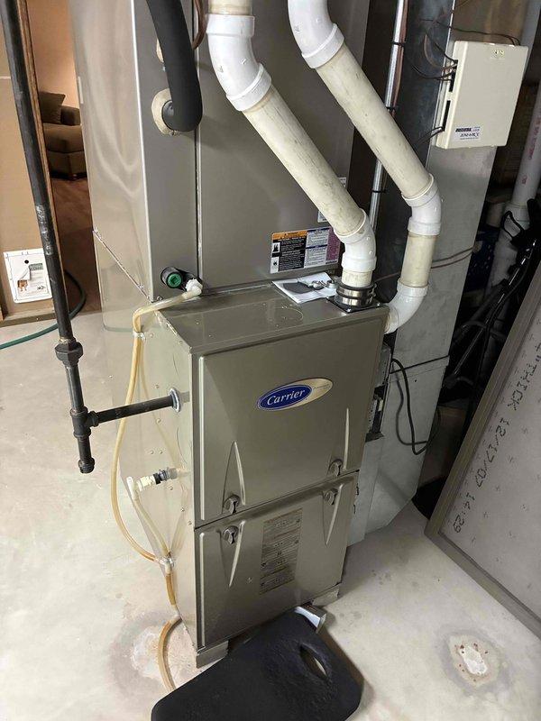 Completed scheduled cooling system maintenance visit as part of prepaid membership program. Performed comprehensive AC tune-up on residential split system, including pressure and temperature diagnostics using manifold gauge set at outdoor condenser unit. Inspected Carrier furnace and indoor air handler components, verified proper operation of all system controls, and documented equipment condition with photographic records. All systems operating within manufacturer specifications.