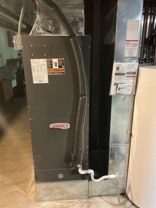 Completed comprehensive air handler tune-up on Lennox system, including full system inspection and performance evaluation. Installed new Honeywell UV light system for improved indoor air quality and microbial control within the ductwork. Replaced existing air filter with Healthy Climate 20x20x5 MERV 16 high-efficiency filter to enhance filtration performance. Inspection revealed significant dust and debris accumulation on evaporator coil fins, particularly on one section of the heat exchanger, indicating the system had been operating under reduced airflow conditions prior to service. All components now functioning within manufacturer specifications.