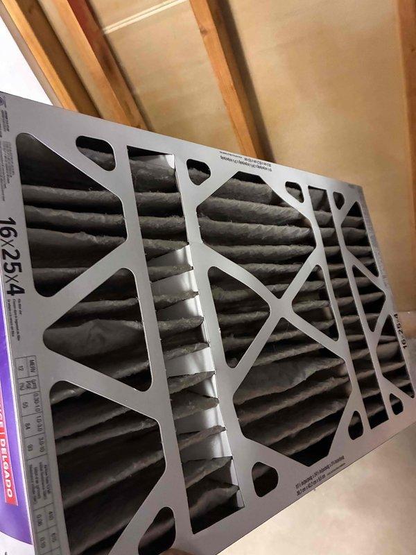 Completed comprehensive air conditioning tune-up on Bryant outdoor condensing unit, including system performance evaluation and replacement of dirty air filters. All components inspected and found operating within normal parameters, with unit properly maintaining cooling capacity for continued efficient operation.
