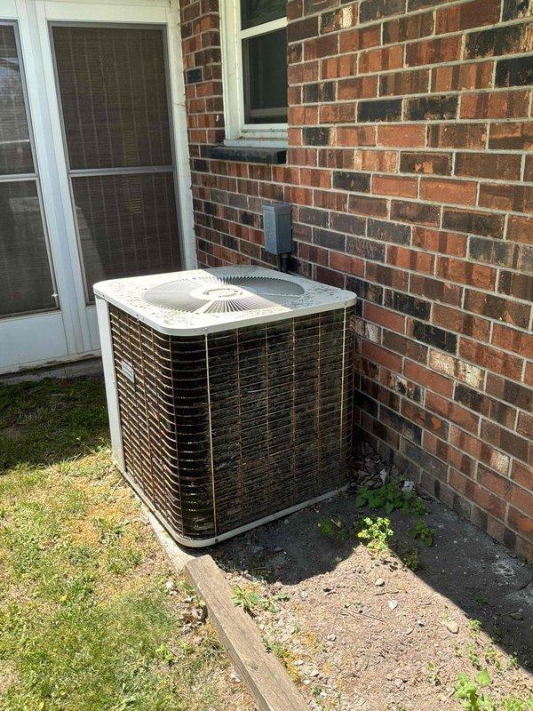 Conducted on-site estimate for replacement of existing air conditioning and natural gas furnace system. Evaluated current outdoor condensing unit and indoor furnace equipment located in basement, documented existing installation conditions including electrical disconnect, refrigerant line set routing, and equipment placement. Provided customer with replacement options and specifications for new HVAC system installation.