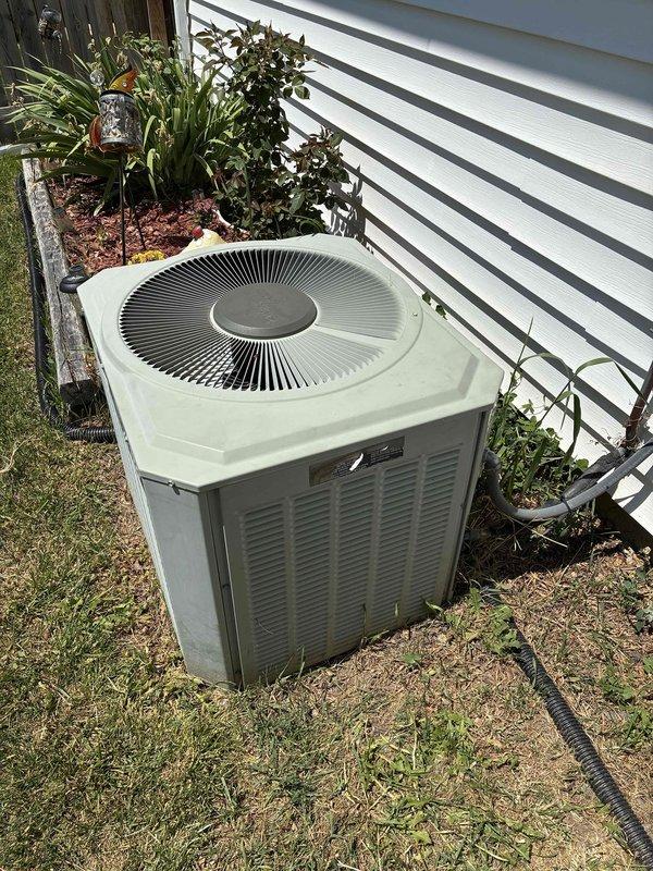 Responded to no cooling call on residential air conditioning system. Upon arrival, performed diagnostic evaluation of outdoor condenser unit and associated components. Unit is 10+ years old and located on exterior side of residence. Conducted visual inspection of condenser cabinet, fan assembly, electrical connections, and refrigerant lines. Assessed unit operation and determined cause of cooling failure. Completed necessary repairs to restore system functionality. Verified proper airflow through condenser coil and fan operation. Confirmed system returned to normal cooling operation before departure. Documented equipment condition with photos for service records.