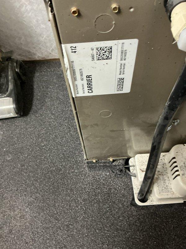 Responded to no cooling complaint in office area. Inspected Carrier HVAC system including outdoor condenser unit and indoor air handler. Condenser unit operating properly with fan motor running and coils clean, no visible damage or refrigerant leaks detected. Verified indoor unit components functioning correctly. System restored to normal cooling operation.