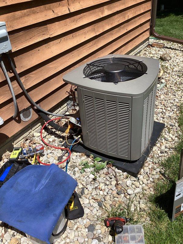 Completed comprehensive spring tune-up on residential air conditioning system. Performed full system diagnostics using manifold gauge set to verify refrigerant pressures and charge levels, confirming proper operation of outdoor condensing unit. All components inspected and system found operating within manufacturer specifications.