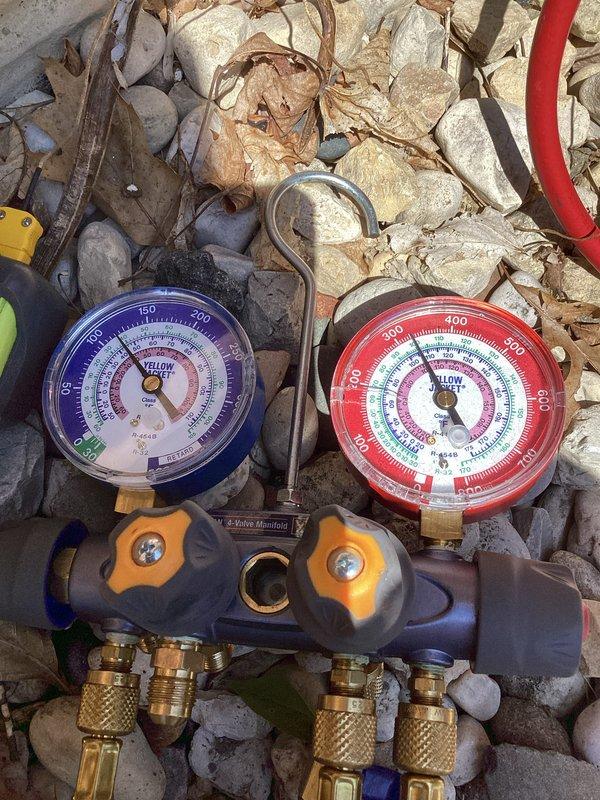 Completed comprehensive spring tune-up on residential air conditioning system. Performed full system diagnostics using manifold gauge set to verify refrigerant pressures and charge levels, confirming proper operation of outdoor condensing unit. All components inspected and system found operating within manufacturer specifications.