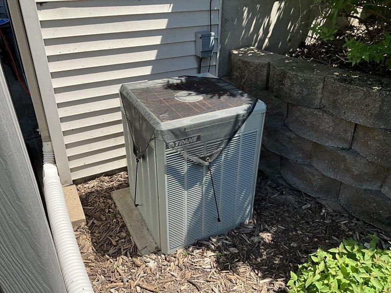 Responded to lead for non-operational furnace located in basement. Conducted assessment of existing HVAC system including basement furnace unit and outdoor Trane condenser, documented equipment condition and installation configuration, and provided replacement estimate for failed heating system.