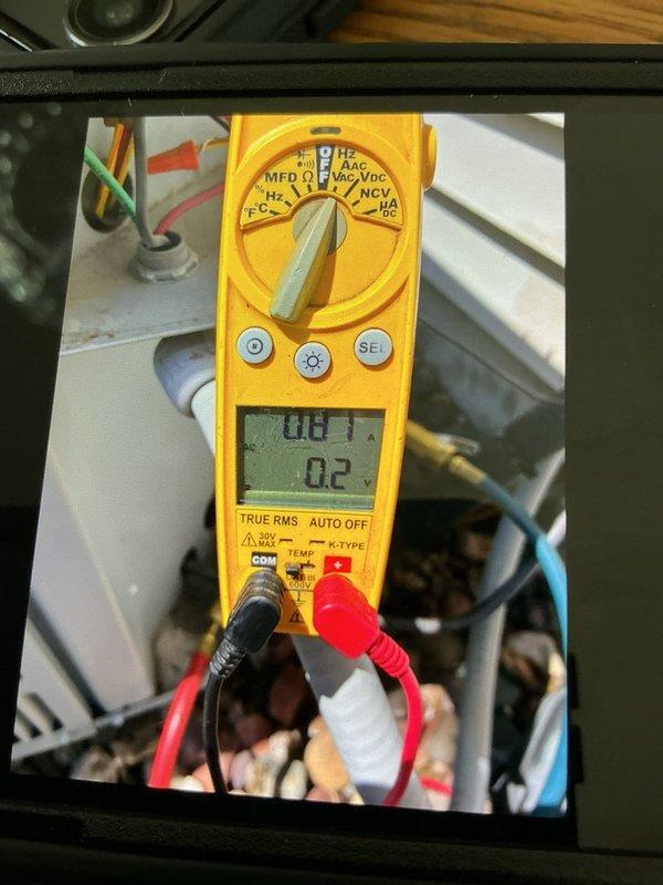 Completed preventive maintenance tune-up on outdoor AC condenser unit. Performed comprehensive system inspection, tested electrical components including capacitor readings with multimeter showing proper values, verified compressor operation, and confirmed all mechanical and electrical systems functioning within manufacturer specifications.
