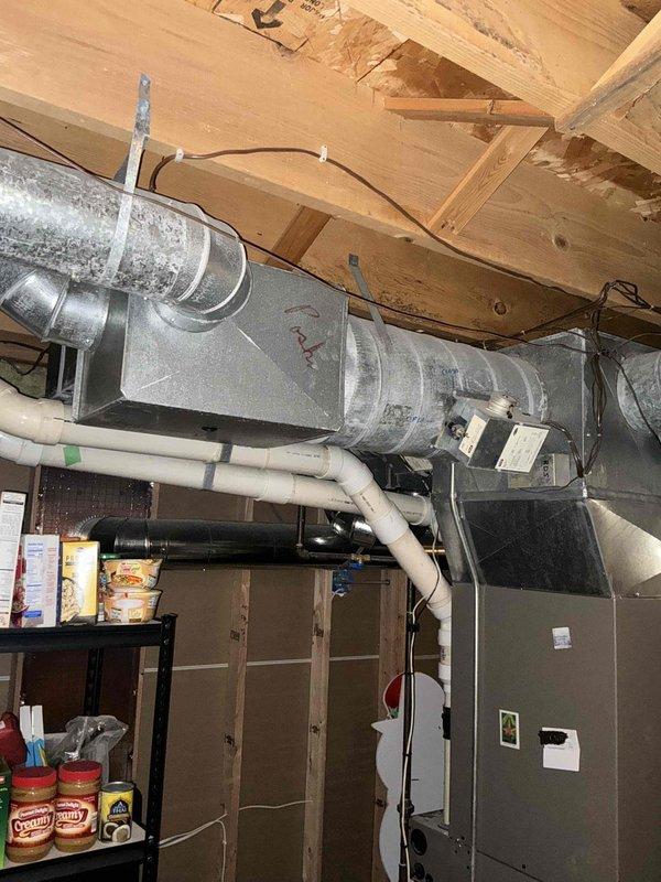 Conducted comprehensive estimate for complete HVAC system replacement including 40-year-old furnace, air conditioning unit, and aging 40-50 gallon gas water heater with upgrade to larger capacity tank. Evaluated existing ductwork configuration and zoning system for potential reconfiguration of dampers and zone controls to improve system efficiency and comfort distribution throughout the property. Assessed basement mechanical room layout and existing infrastructure to determine optimal equipment placement and integration requirements for new system installation.