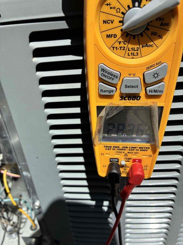 Responded to no cooling complaint on residential air conditioning system. Upon arrival, performed diagnostic testing using digital multimeter to measure electrical values and system performance on outdoor condensing unit. Evaluated unit operation and documented equipment condition with photos of outdoor unit installed on concrete pad with proper clearances. System tested and measurements recorded for customer review.
