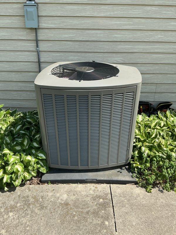 Completed annual air conditioning tune-up and preventative maintenance service on residential split-system HVAC equipment. Performed comprehensive inspection of outdoor condenser unit and indoor Lennox furnace system, verified proper operation of all components, checked refrigerant levels, cleaned condenser coils, inspected electrical connections and disconnect box, and confirmed adequate airflow through both indoor and outdoor units.
