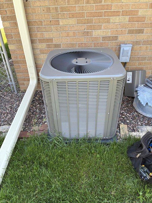 Completed comprehensive HVAC tune-up service on residential air conditioning system. Performed standard maintenance procedures including inspection of outdoor condenser unit, verification of electrical connections at disconnect box, and confirmed proper thermostat operation on Honeywell Home ProSeries unit. System tested and operating within normal parameters.