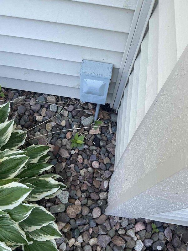 Conducted on-site evaluation for complete air conditioning system replacement. Assessed existing electrical service panel capacity and exterior equipment location to provide comprehensive estimate for new AC installation, documenting current infrastructure including utility connections and available mounting space at residence exterior.