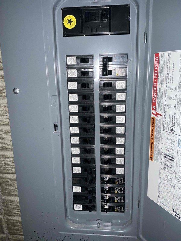 Conducted on-site evaluation for complete air conditioning system replacement. Assessed existing electrical service panel capacity and exterior equipment location to provide comprehensive estimate for new AC installation, documenting current infrastructure including utility connections and available mounting space at residence exterior.