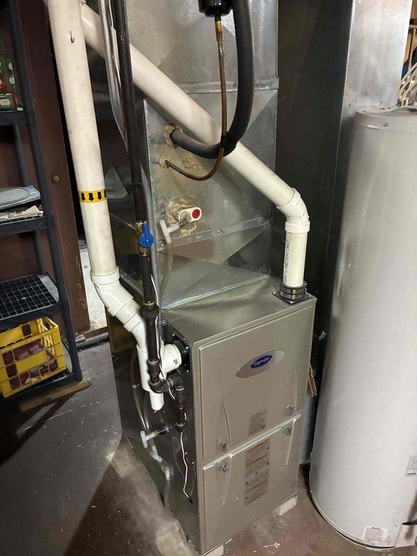 Completed air conditioning tune-up service on residential Carrier system. Inspected outdoor condenser unit, including coil condition, electrical connections, and refrigerant lines. Customer was advised to contact the office to schedule furnace tune-up, as it could not be completed during this visit due to scheduling conflicts.
