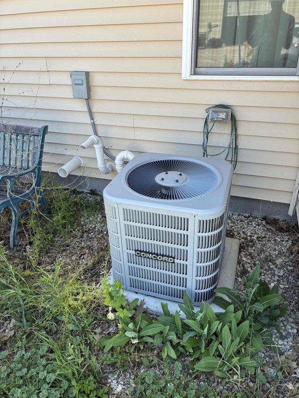 Responded to no-start condition on 4-year-old Lennox outdoor condensing unit. Upon inspection, discovered failed contactor coil showing visible heat damage and discoloration to copper windings. Replaced defective contactor, restored power to unit, and verified proper system operation with successful startup and normal cooling cycle.