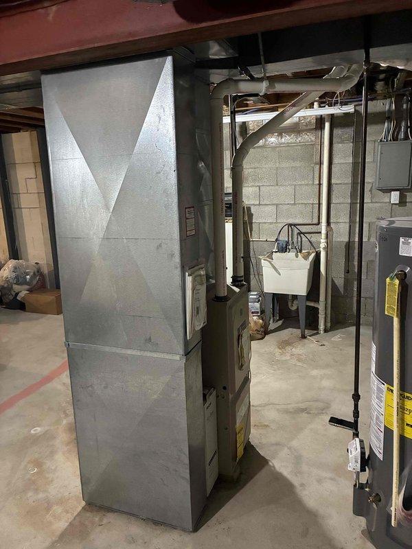 Provided comprehensive estimate for complete HVAC system replacement, including natural gas furnace and air conditioning unit, both of which are currently operational but have exceeded 20 years of service life. Inspected existing basement-mounted furnace installation and outdoor condenser unit, documented equipment condition through photographs, assessed ductwork configuration and electrical connections, and prepared detailed replacement proposal for new high-efficiency heating and cooling system to improve energy performance and reliability before aging equipment fails.