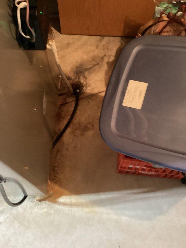 Completed installation of new air conditioning system and evaporator coil at residential property. New outdoor condensing unit was positioned on gravel pad against exterior wall with proper clearances maintained, and system was charged and tested to manufacturer's specifications with all readings within acceptable parameters.