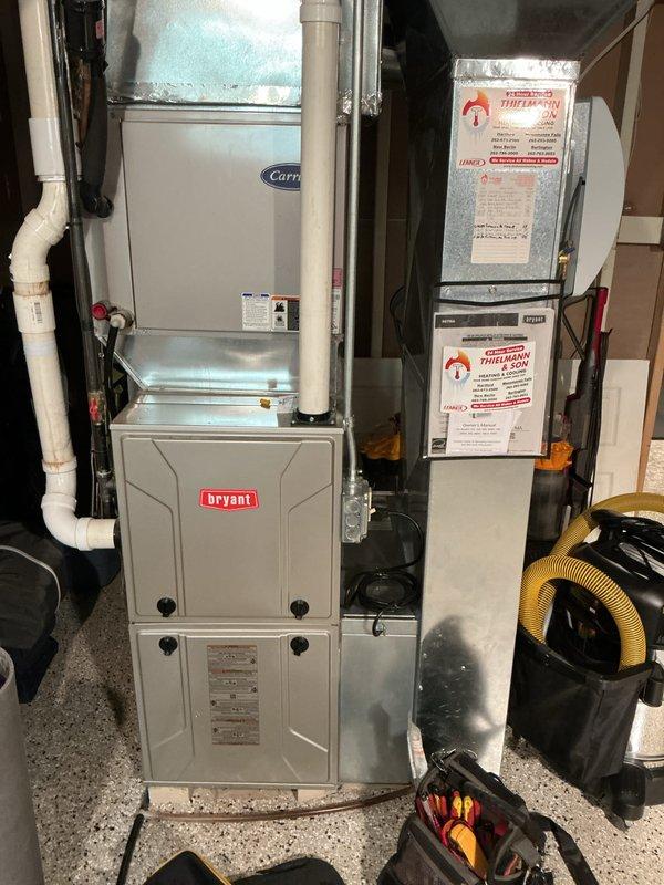 Completed comprehensive furnace and air conditioning tune-up on Bryant gas furnace and Carrier evaporator coil system. Performed standard maintenance procedures including filter inspection, burner assembly cleaning, blower motor lubrication, electrical connection testing, condensate drain line verification, and system operational testing to ensure proper heating and cooling functionality for the upcoming season.